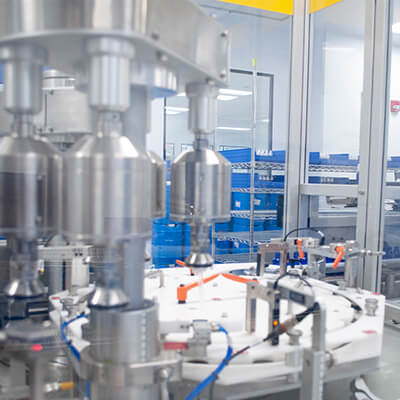 Close-Up of Bottle Capper in Cleanroom