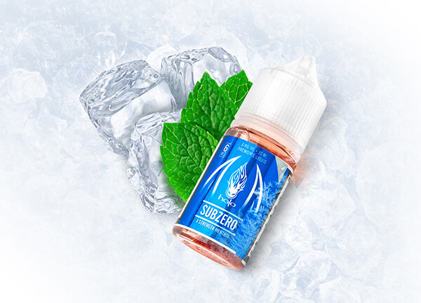 Subzero Vape Juice 30ml Bottle on Ice Next to Mint Leaf