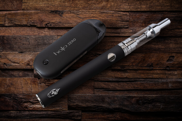 Electronic Nicotine Delivery Triton II and Halo Zero Vaping Hardware on Table
